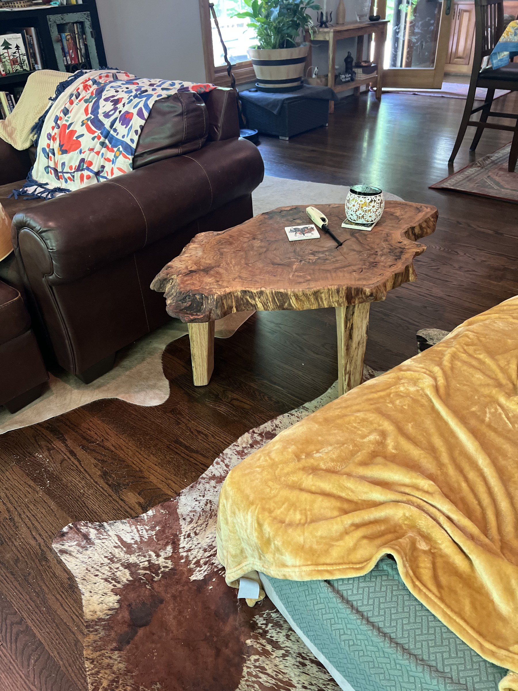 Finished live-edge slab table in a living room