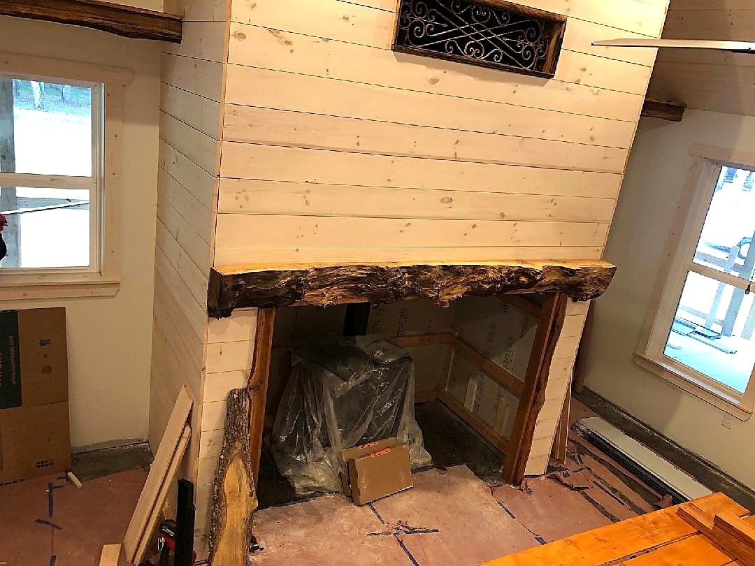 Fireplace with live-edge mantel install — Live Edge Oak Co